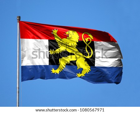 National flag of Benelux on a flagpole