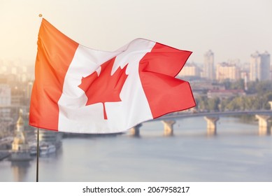 National Flag Of Canada In Modern City