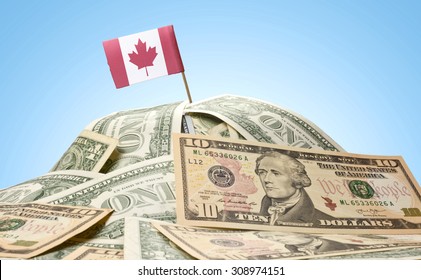 The national flag of Canada sticking in a pile of american dollars.(series)