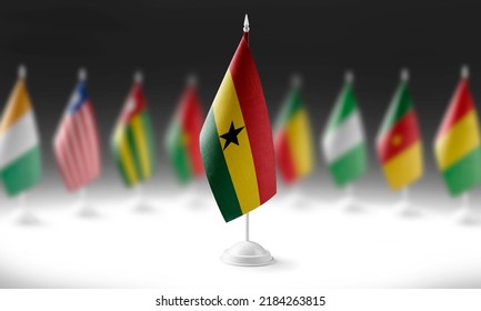 The national flag of the Ghana on the background of flags of other countries