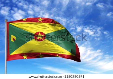National flag of Grenada on a flagpole