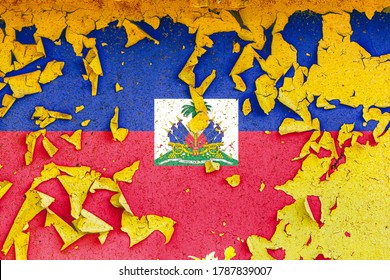 The national flag of Haiti is painted on an old metal wall with ragged paint. Country symbol.