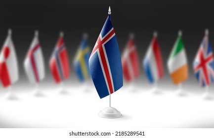 The national flag of the Iceland on the background of flags of other countries