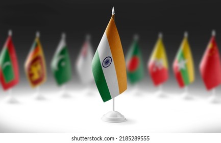 The national flag of the India on the background of flags of other countries