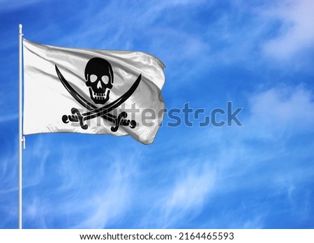National flag of Jolly Roger Pirates white on a flagpole