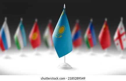 The national flag of the Kazakhstan on the background of flags of other countries