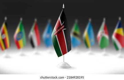 The national flag of the Kenya on the background of flags of other countries