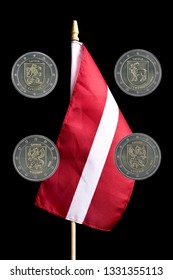 National Flag Of Latvia With Series Of Commemorative Coins Dedicated To Latvian Regions Kurzeme, Latgale, Vidzeme And Zemgale