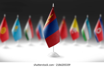 The national flag of the Mongolia on the background of flags of other countries