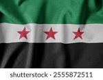 National Flag on Textured Fabric Background. Silk textured flag, realistic wave and flag look. SY Flag of Syria (New)