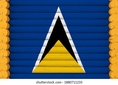 National Flag  Of Saint Lucia On A Wooden Wall Background. The Concept Of National Pride And A Symbol Of The Country. Flags Painted On A House