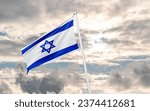 The national flag of the State of Israel .Hamas Attack: Israel Weighs Ground Invasion on Gaza Strip in Risky Strategy