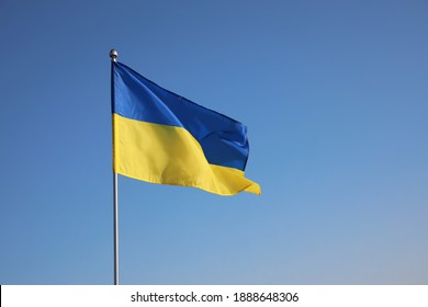 National flag Ukraine against blue sky
