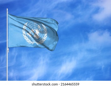 National flag of UN on a flagpole - Shutterstock ID 2164465559