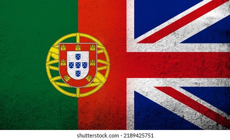 National Flag Of United Kingdom (Great Britain) Union Jack With Portugal National Flag. Grunge Background
