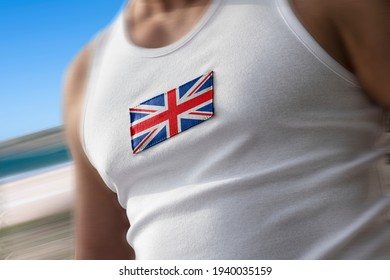 The national flag of United Kingdom on the athlete's chest. - Shutterstock ID 1940035159