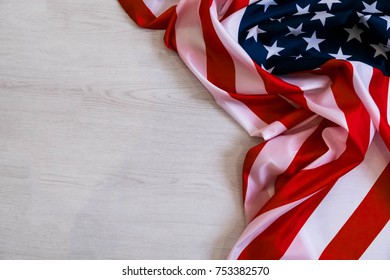 national flag of USA. Natural light. Selective focus. Close up on a gray background. Top view, flat lay. copy space
