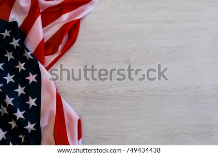 national flag of USA. Natural light. Selective focus. Close up on a gray background. Top view, flat lay. copy space