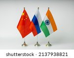 National flags of China, Russia and India on a light background.