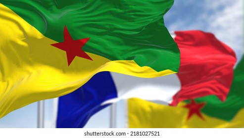 National Flags Of French Guiana Waving With The Flag Of France On A Clear Day. French Guiana Is An Overseas Departmentregion And Single Territorial Collectivity Of France