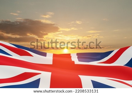 National flags of United Kingdom on sunset sky background. Background with place for your text. 3d rendering.