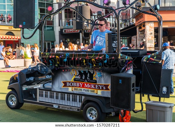 National Harbor, Maryland /USA -June 2, 2017: A\
shot of the Bobby McKey`s Dueling Piano Bar mobile DJ at the\
National Harbor, Washington DC /\
Maryland