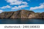 The National Historic Site of Signal Hill, featuring the Cabot Tower, is visible from Fort Amherst, which is another National Historic Site located across the Narrows.