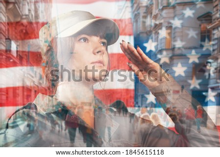National holidays in the United States. Portrait of a female soldier saluting, against the background of the American flag. Side view. Double exposure