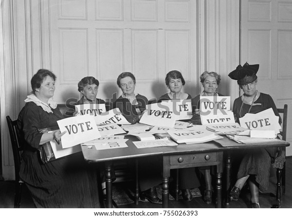 National League of Women Voters hold\
up signs reading, \'VOTE\', Sept. 17, 1924. Millions of women voted\
in 1920 and 1924, but in a lower proportion than\
men.