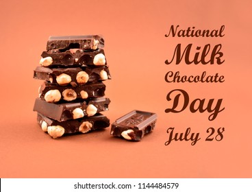 National Milk Chocolate Day Stock Images. Pile Of Chocolate Stock Images. Nut Chocolate On A Brown Background. Important Day