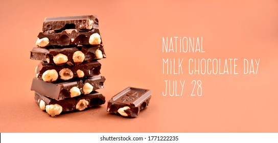 National Milk Chocolate Day Stock Images. Pile Of Chocolate With Nuts Images. Chocolate Isolated On A Brown Background. Milk Chocolate Day Poster, July 28. Important Day