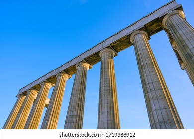 The National Monument On Carlton Hill In Edinburgh, Scotland With Sunrise