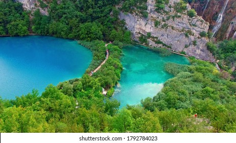 The National Park of Plivice Lakes in mountain Krast in Croatia. The aerial view of board walk on waterfall cascade of Plitvice Lakes, the UNESCO World Heritage. Travel destination for turists. - Shutterstock ID 1792784023