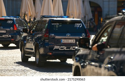 National Police (Policia) Of Spain With Toyota Land Cruiser SUV Cars In Plaza Mayor From Madrid, 2022. Law Enforcement.