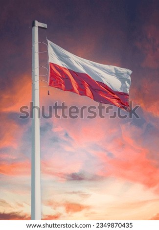 National state flag of Poland. White-red banner and stormy sky