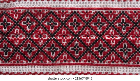 National Ukrainian Embroidery. Handmade. Cross Stitch In Red, Black And White. Traditional Shirt Of Ukraine. Embroider Background.