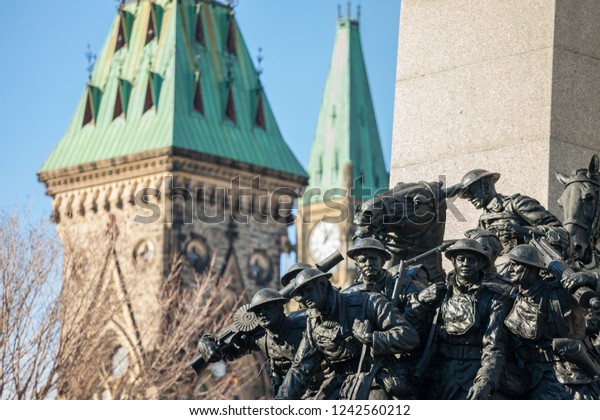 National War memorial of Ottawa, Ontario,\
Canada, facing the Canadian parliament, with its statues of\
soldiers from the First World War, dedicated to the canadians who\
died in conflicts\
\
