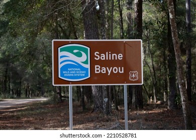 NATIONAL WILD AND SCENIC RIVERS SYSTEM At SALINE BAYOU SIGN , KISATCHIE NATIONAL FOREST CLOUD CROSSING RECREATION AREA OF THE WINN RANGER DISTRICT, LOUISIANAUSA – JANUARY 13 2022: Scenic River Sign Fo