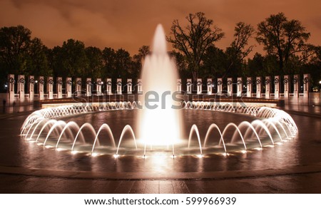 The National World War II Memorial Fountains at night in Washington, DC.