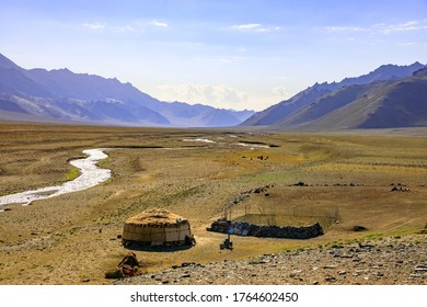 National Yurt And Mountain River In Tajikistan