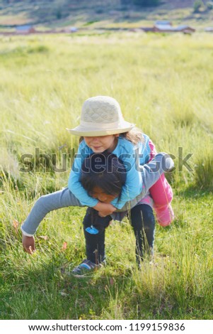 Similar – Image, Stock Photo Little girl and woman carrying basket with apples