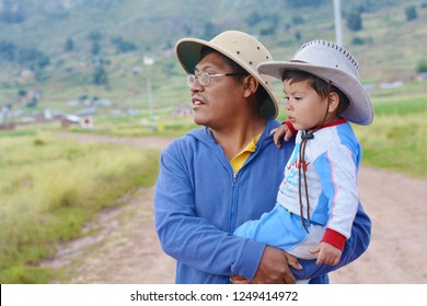 Native American Man With His Little Child In The Countryside.