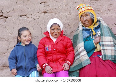 Native American Old Woman With Her Grandchildren.