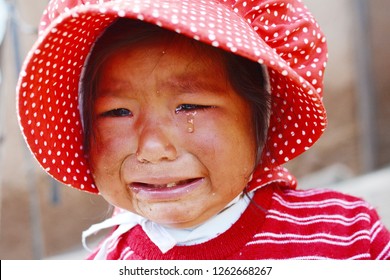 Native American Toddler Girl Crying Outdoor.