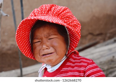 Native American Toddler Girl Crying Outdoor.