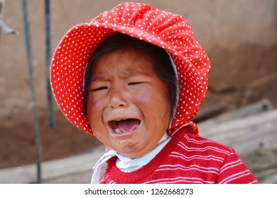 Native American Toddler Girl Crying Outdoor.