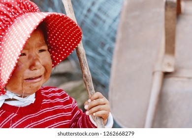 Native American Toddler Girl Crying Outdoor.