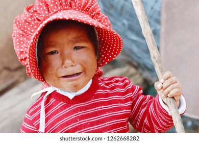 Native American Toddler Girl Crying Outdoor.