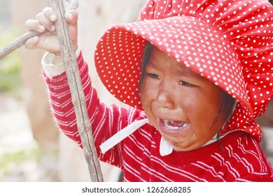 Native American Toddler Girl Crying Outdoor.