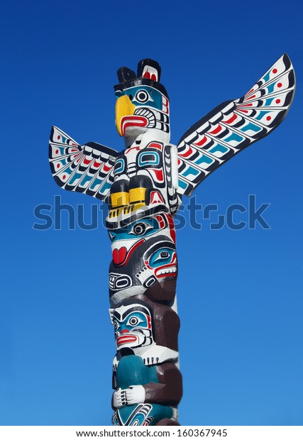 A Native American totem\
pole